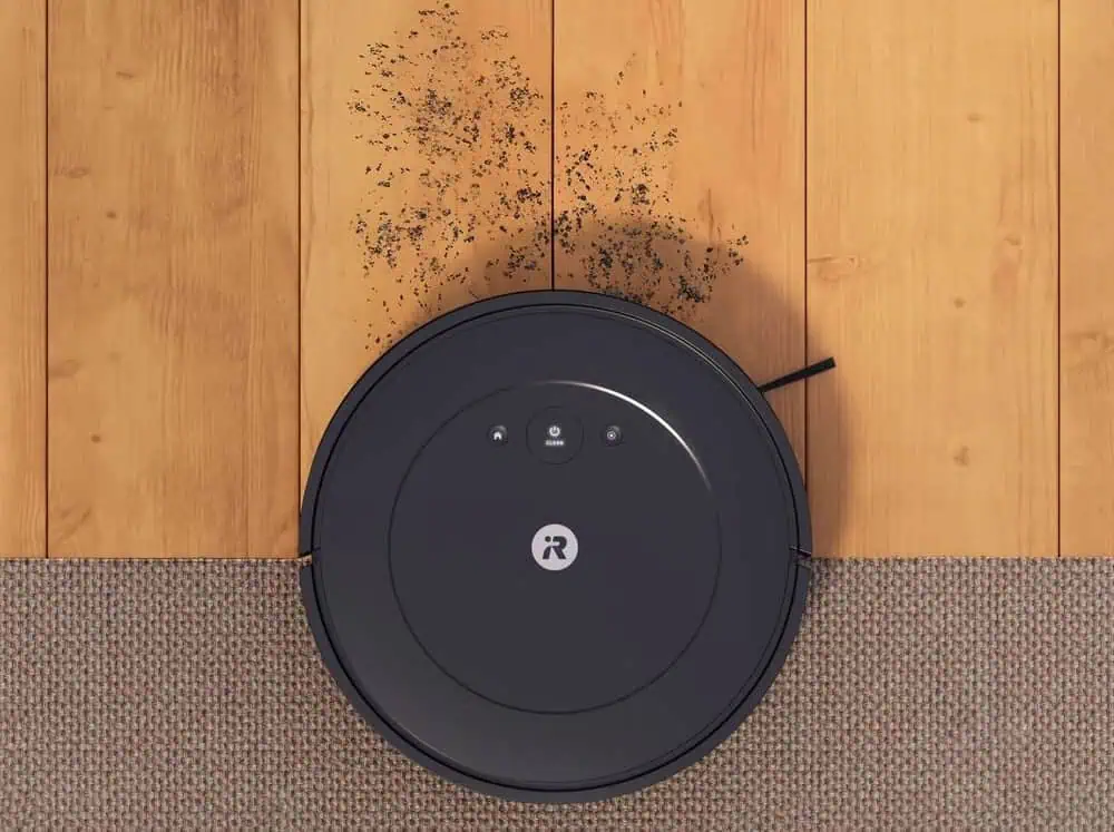 Roomba Vac Essential Schwarz Foto Insitu Schmutz Teppich Hartholzböden Telefon Einzelhandel 4000 x 4000
